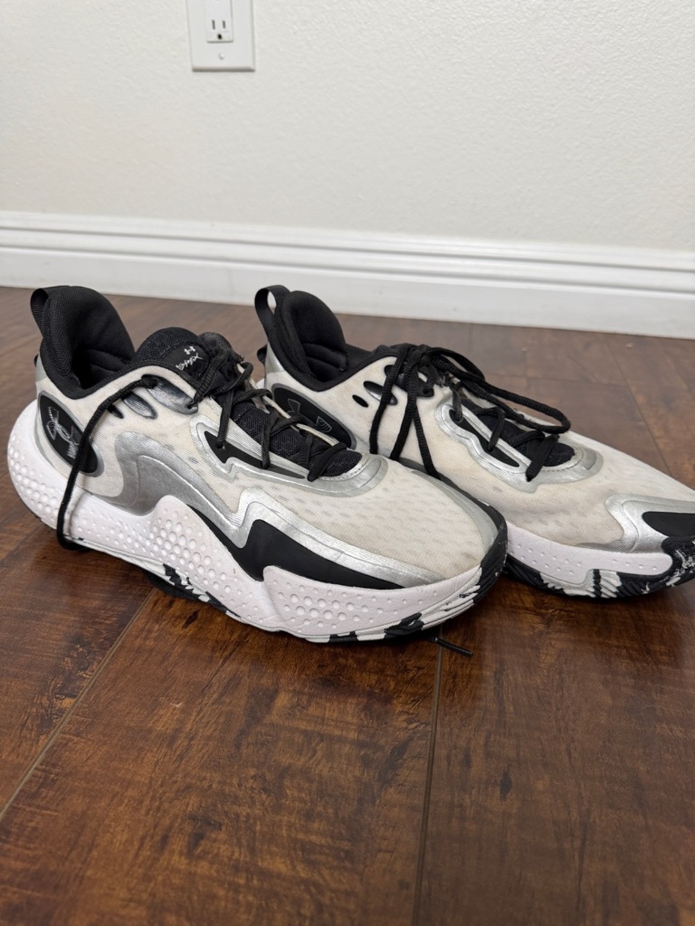 Under Armour Black Athletic Shoe with Yellow Accent